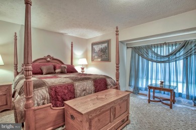 Tucked on a beautiful wooded 0.68 acre lot is this charming on Alpine Lake Resort in West Virginia - for sale on GolfHomes.com, golf home, golf lot