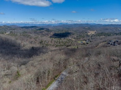 This lot offers a beautiful setting with expansive mountain on Old Edwards Club in North Carolina - for sale on GolfHomes.com, golf home, golf lot