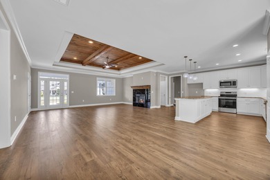 This brand-new, all-brick beauty delivers standout design on Long Bay Club in South Carolina - for sale on GolfHomes.com, golf home, golf lot