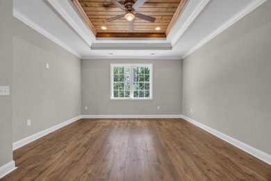 This brand-new, all-brick beauty delivers standout design on Long Bay Club in South Carolina - for sale on GolfHomes.com, golf home, golf lot