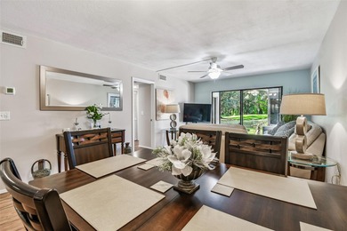 Beautifully Furnished (optional) 2-Bed/2-Bath Ground-Floor Condo on University Park Country Club in Florida - for sale on GolfHomes.com, golf home, golf lot