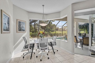 Gracefully set along the prestigious Calusa Lakes Golf Course on Calusa Lakes Golf Club in Florida - for sale on GolfHomes.com, golf home, golf lot