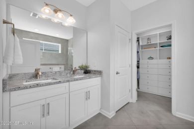 Highly sought-after floor plan on a wide 70' preserve lot in one on Palm Valley Golf Club in Florida - for sale on GolfHomes.com, golf home, golf lot