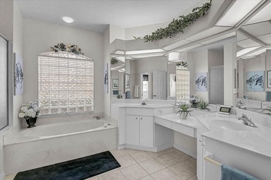 Gracefully set along the prestigious Calusa Lakes Golf Course on Calusa Lakes Golf Club in Florida - for sale on GolfHomes.com, golf home, golf lot