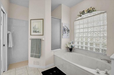 Gracefully set along the prestigious Calusa Lakes Golf Course on Calusa Lakes Golf Club in Florida - for sale on GolfHomes.com, golf home, golf lot