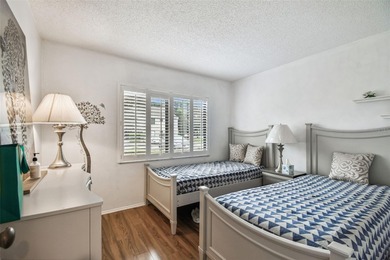 Beautifully Furnished (optional) 2-Bed/2-Bath Ground-Floor Condo on University Park Country Club in Florida - for sale on GolfHomes.com, golf home, golf lot