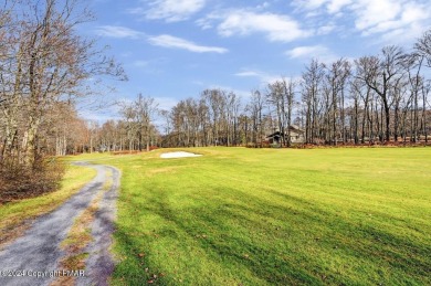 Overlooking the Timber Trails golf course, 203 Golfers Way on Lake Naomi Timber Trails Golf Club in Pennsylvania - for sale on GolfHomes.com, golf home, golf lot