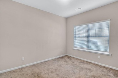 This beautifully maintained 3-bedroom, 2.5-bath townhome in the on Browns Mill Golf Course in Georgia - for sale on GolfHomes.com, golf home, golf lot