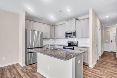 This beautifully maintained 3-bedroom, 2.5-bath townhome in the on Browns Mill Golf Course in Georgia - for sale on GolfHomes.com, golf home, golf lot