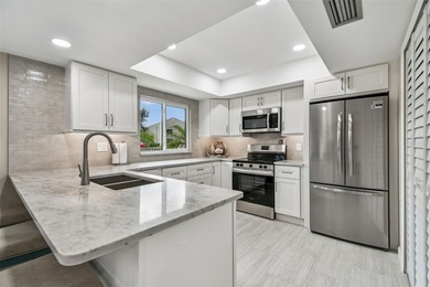 Beautifully Furnished (optional) 2-Bed/2-Bath Ground-Floor Condo on University Park Country Club in Florida - for sale on GolfHomes.com, golf home, golf lot