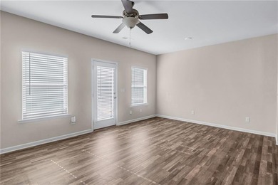 This beautifully maintained 3-bedroom, 2.5-bath townhome in the on Browns Mill Golf Course in Georgia - for sale on GolfHomes.com, golf home, golf lot