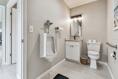 Beautifully Furnished (optional) 2-Bed/2-Bath Ground-Floor Condo on University Park Country Club in Florida - for sale on GolfHomes.com, golf home, golf lot