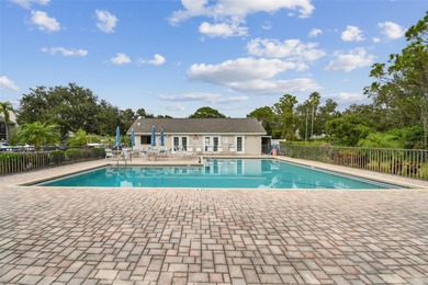 Beautifully Furnished (optional) 2-Bed/2-Bath Ground-Floor Condo on University Park Country Club in Florida - for sale on GolfHomes.com, golf home, golf lot
