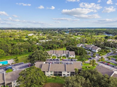 Beautifully Furnished (optional) 2-Bed/2-Bath Ground-Floor Condo on University Park Country Club in Florida - for sale on GolfHomes.com, golf home, golf lot