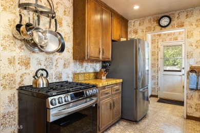 California Bungalow with Untapped Potential! This charming 1,825 on Van Nuys Golf Course in California - for sale on GolfHomes.com, golf home, golf lot