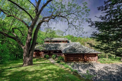 Tucked into the wooded hillside at the end of long ascending on Eagle Ridge Inn and Resort in Illinois - for sale on GolfHomes.com, golf home, golf lot