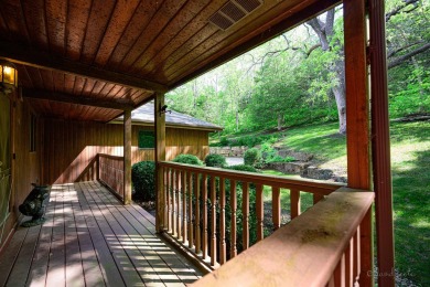 Tucked into the wooded hillside at the end of long ascending on Eagle Ridge Inn and Resort in Illinois - for sale on GolfHomes.com, golf home, golf lot