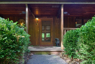 Tucked into the wooded hillside at the end of long ascending on Eagle Ridge Inn and Resort in Illinois - for sale on GolfHomes.com, golf home, golf lot