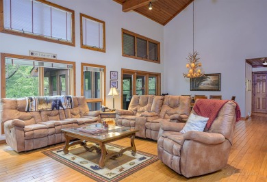 Tucked into the wooded hillside at the end of long ascending on Eagle Ridge Inn and Resort in Illinois - for sale on GolfHomes.com, golf home, golf lot
