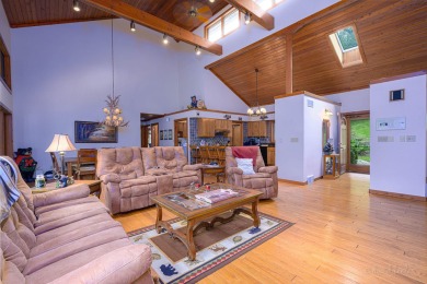 Tucked into the wooded hillside at the end of long ascending on Eagle Ridge Inn and Resort in Illinois - for sale on GolfHomes.com, golf home, golf lot