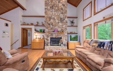 Tucked into the wooded hillside at the end of long ascending on Eagle Ridge Inn and Resort in Illinois - for sale on GolfHomes.com, golf home, golf lot