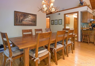 Tucked into the wooded hillside at the end of long ascending on Eagle Ridge Inn and Resort in Illinois - for sale on GolfHomes.com, golf home, golf lot