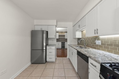 Step inside this stylish 2-bedroom, 1-bathroom condo and fall in on Maple Meadows Golf Club in Illinois - for sale on GolfHomes.com, golf home, golf lot