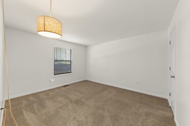 Step inside this stylish 2-bedroom, 1-bathroom condo and fall in on Maple Meadows Golf Club in Illinois - for sale on GolfHomes.com, golf home, golf lot