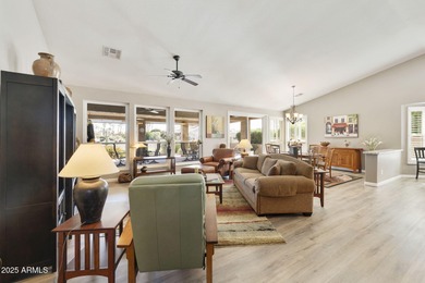 Nestled in a vibrant gated active adult community, this stunning on Palo Verde Golf and Country Club in Arizona - for sale on GolfHomes.com, golf home, golf lot