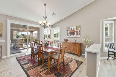 Nestled in a vibrant gated active adult community, this stunning on Palo Verde Golf and Country Club in Arizona - for sale on GolfHomes.com, golf home, golf lot