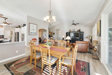 Nestled in a vibrant gated active adult community, this stunning on Palo Verde Golf and Country Club in Arizona - for sale on GolfHomes.com, golf home, golf lot