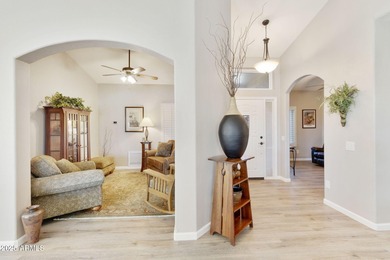 Nestled in a vibrant gated active adult community, this stunning on Palo Verde Golf and Country Club in Arizona - for sale on GolfHomes.com, golf home, golf lot