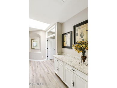 Nestled in a vibrant gated active adult community, this stunning on Palo Verde Golf and Country Club in Arizona - for sale on GolfHomes.com, golf home, golf lot