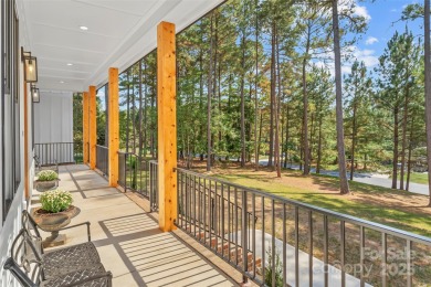 This recently built modern farmhouse (2024) still looks brand on Granada Farms Country Club in North Carolina - for sale on GolfHomes.com, golf home, golf lot