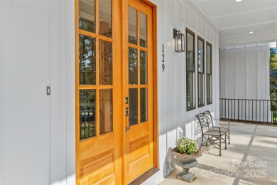 This recently built modern farmhouse (2024) still looks brand on Granada Farms Country Club in North Carolina - for sale on GolfHomes.com, golf home, golf lot