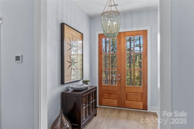 This recently built modern farmhouse (2024) still looks brand on Granada Farms Country Club in North Carolina - for sale on GolfHomes.com, golf home, golf lot