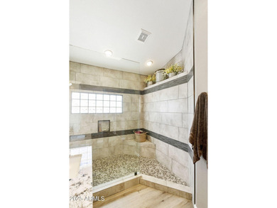 Nestled in a vibrant gated active adult community, this stunning on Palo Verde Golf and Country Club in Arizona - for sale on GolfHomes.com, golf home, golf lot