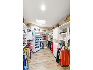 Nestled in a vibrant gated active adult community, this stunning on Palo Verde Golf and Country Club in Arizona - for sale on GolfHomes.com, golf home, golf lot