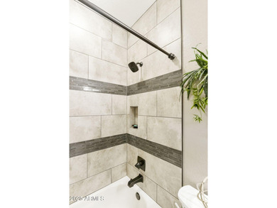 Nestled in a vibrant gated active adult community, this stunning on Palo Verde Golf and Country Club in Arizona - for sale on GolfHomes.com, golf home, golf lot