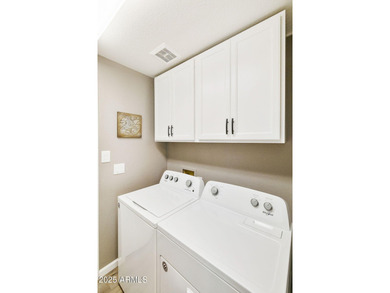 Nestled in a vibrant gated active adult community, this stunning on Palo Verde Golf and Country Club in Arizona - for sale on GolfHomes.com, golf home, golf lot