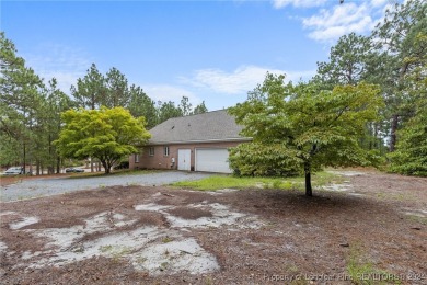 Nestled in the serene Foxfire Village, this charming 2,270 on Foxfire Golf and Country Club in North Carolina - for sale on GolfHomes.com, golf home, golf lot