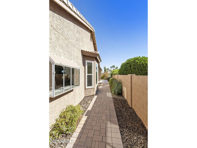 Nestled in a vibrant gated active adult community, this stunning on Palo Verde Golf and Country Club in Arizona - for sale on GolfHomes.com, golf home, golf lot