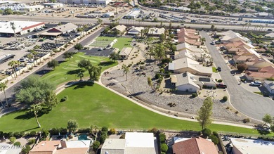 Nestled in a vibrant gated active adult community, this stunning on Palo Verde Golf and Country Club in Arizona - for sale on GolfHomes.com, golf home, golf lot