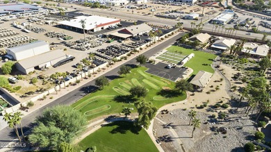 Nestled in a vibrant gated active adult community, this stunning on Palo Verde Golf and Country Club in Arizona - for sale on GolfHomes.com, golf home, golf lot