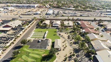 Nestled in a vibrant gated active adult community, this stunning on Palo Verde Golf and Country Club in Arizona - for sale on GolfHomes.com, golf home, golf lot
