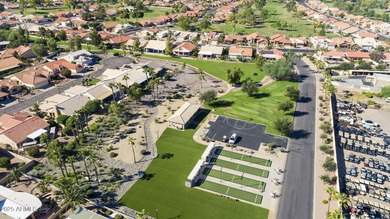 Nestled in a vibrant gated active adult community, this stunning on Palo Verde Golf and Country Club in Arizona - for sale on GolfHomes.com, golf home, golf lot