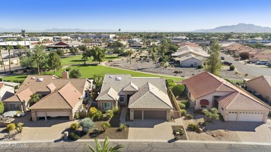Nestled in a vibrant gated active adult community, this stunning on Palo Verde Golf and Country Club in Arizona - for sale on GolfHomes.com, golf home, golf lot