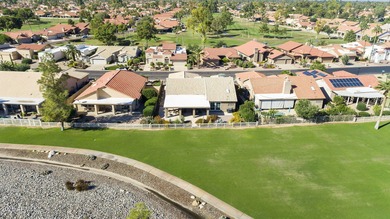 Nestled in a vibrant gated active adult community, this stunning on Palo Verde Golf and Country Club in Arizona - for sale on GolfHomes.com, golf home, golf lot