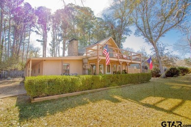 This charming waterview 1685 square foot modified A-Frame with a on Hide-A-Way Lake Golf Course in Texas - for sale on GolfHomes.com, golf home, golf lot