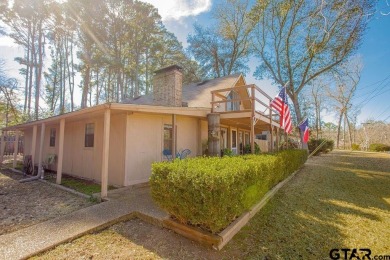 This charming waterview 1685 square foot modified A-Frame with a on Hide-A-Way Lake Golf Course in Texas - for sale on GolfHomes.com, golf home, golf lot